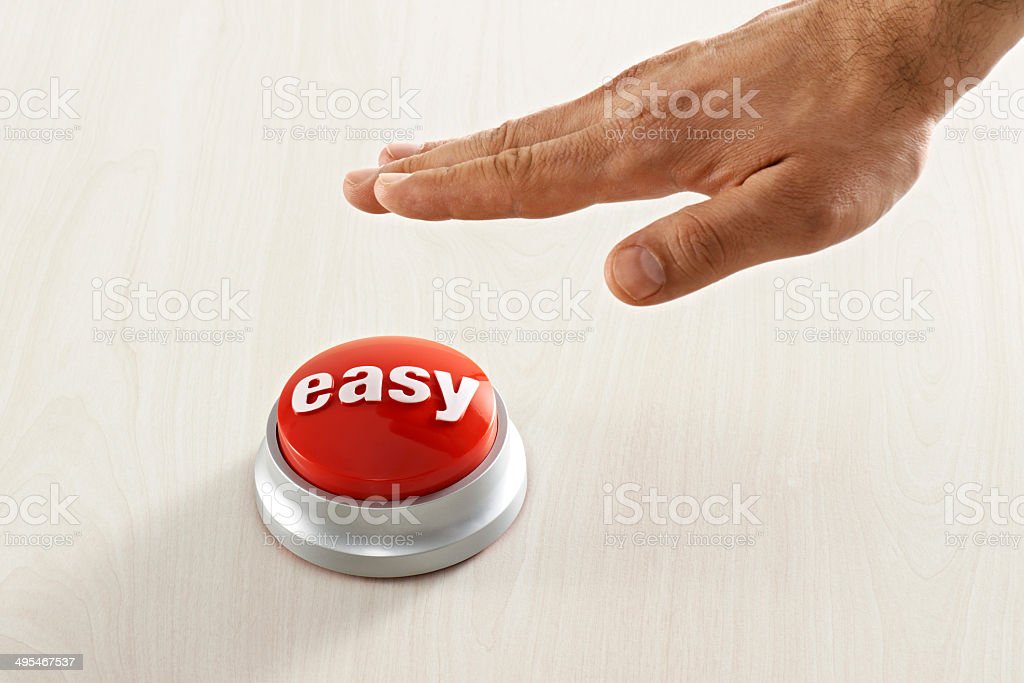 Man reaching for the easy button - image from istock